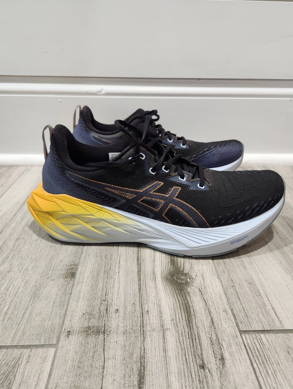 ASICS Novablast 4 'Black Thunder Blue 1011B693 Men's Size 11